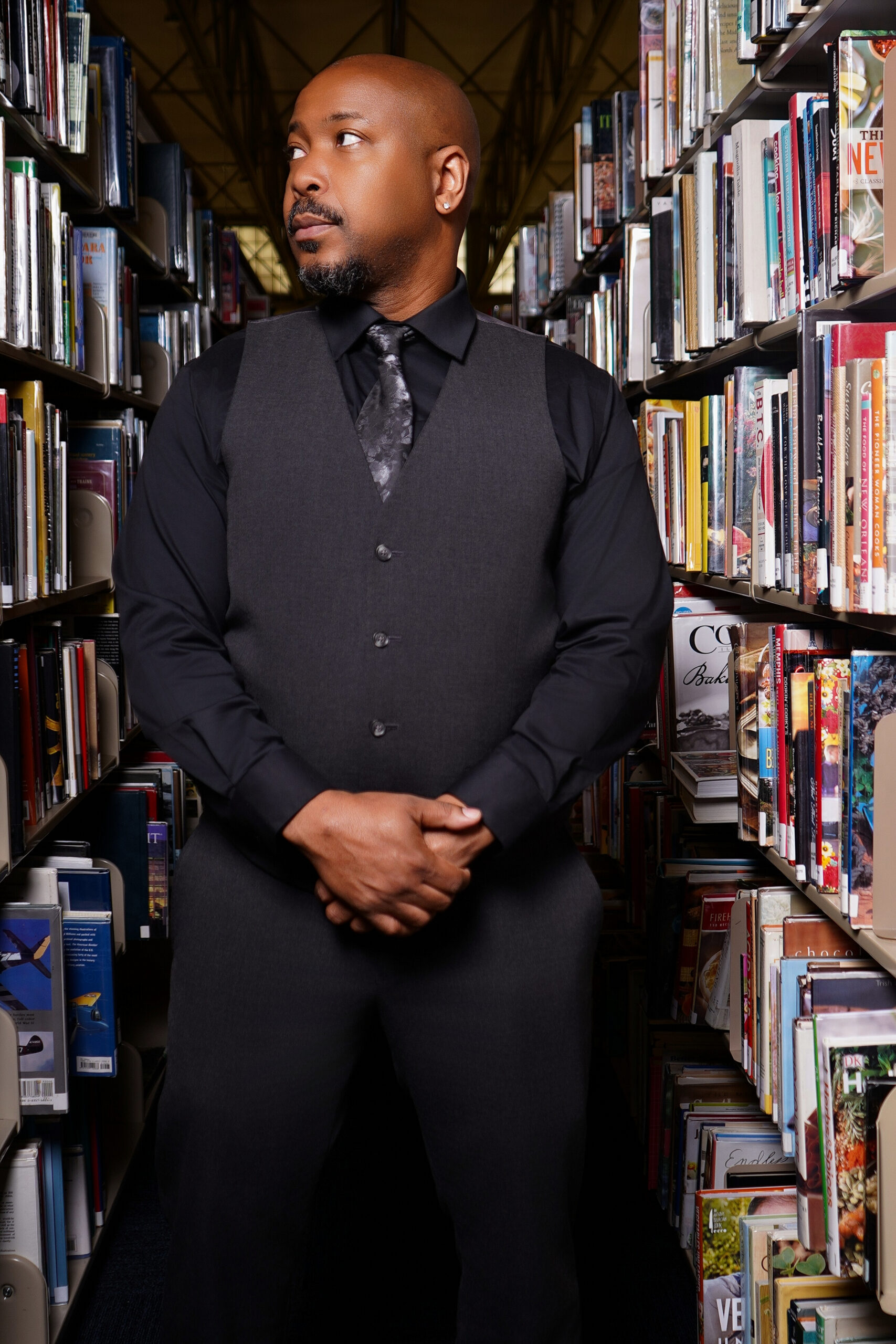 Jerome McNeary in a library aisle